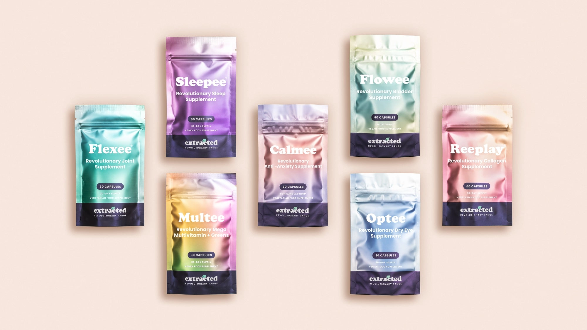 Flat lay of Extracted pouches in different colours on a soft peach surface